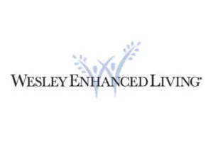 Logotipo de la empresa Wesley Enhanced Living