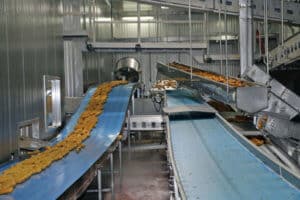 corn dog assembly line image